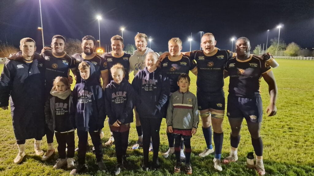 Aireborough juniors with some the Leeds Tykes players